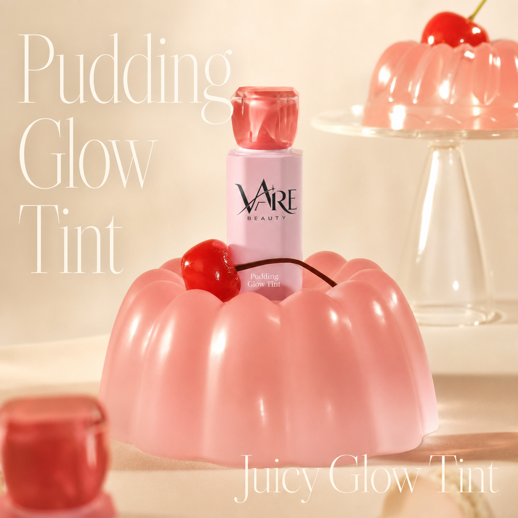 VAIRE BEAUTY Pudding Glow Tint bottle in pink jelly pudding lifestyle scene on warm ivory