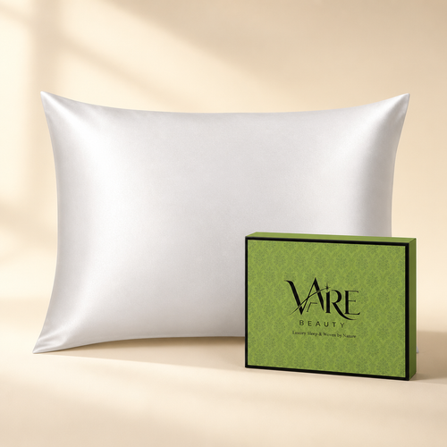 VAIRE BEAUTY ivory white mulberry silk pillowcase with green gift box on warm ivory studio background