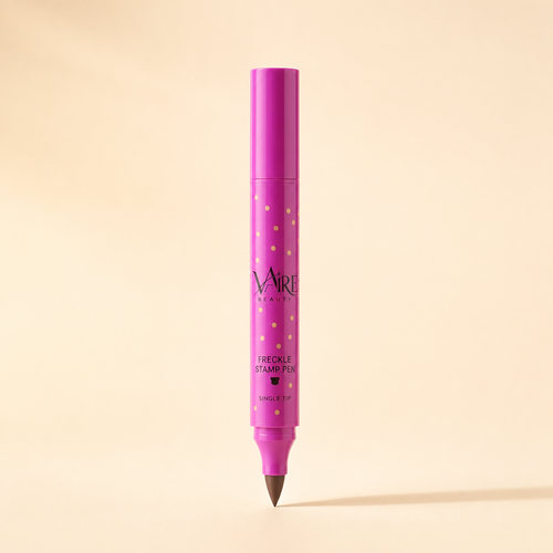 VAIRE BEAUTY freckle stamp pen on warm ivory studio background