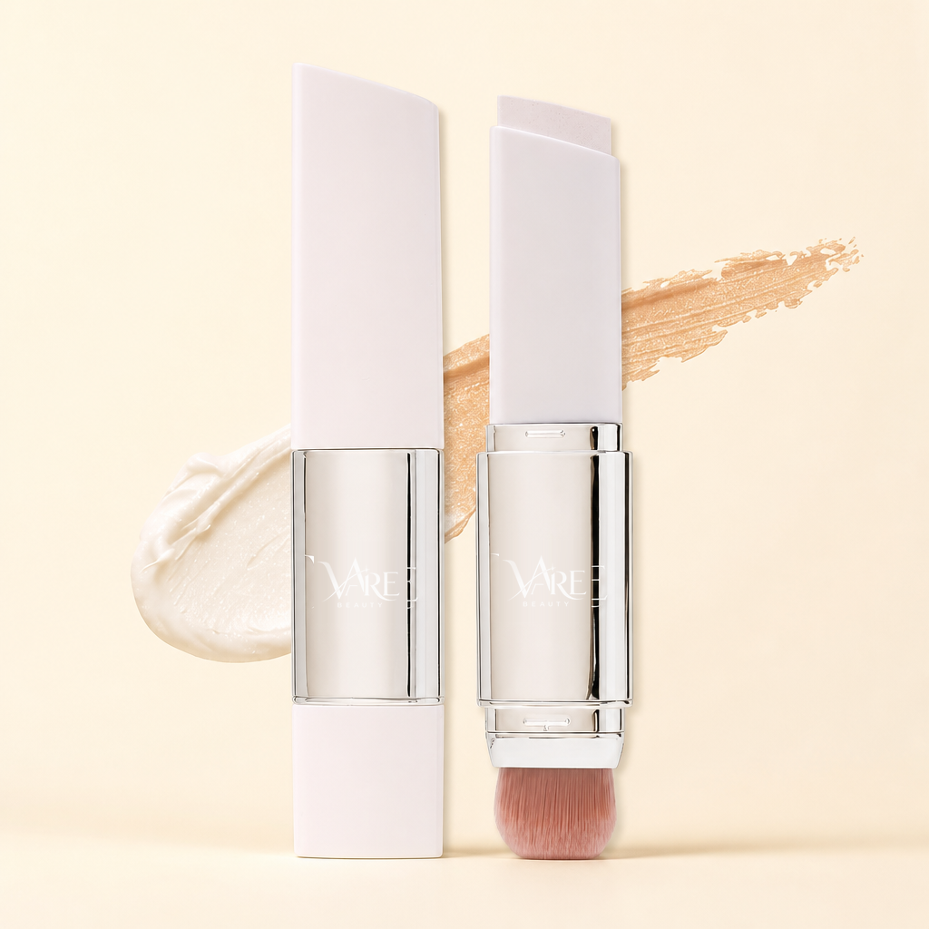 VAIRE BEAUTY color changing foundation stick with brush on warm ivory studio background